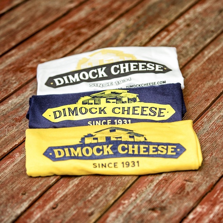 https://www.dimockdairy.com/static/ecommerce/235/235490/media/catalog/product/cache/1/image/9df78eab33525d08d6e5fb8d27136e95/d/i/dimock_cheese_t-shirts2/www.dimockdairy.com-Dimock-Cheese-T-Shirt-31.jpeg